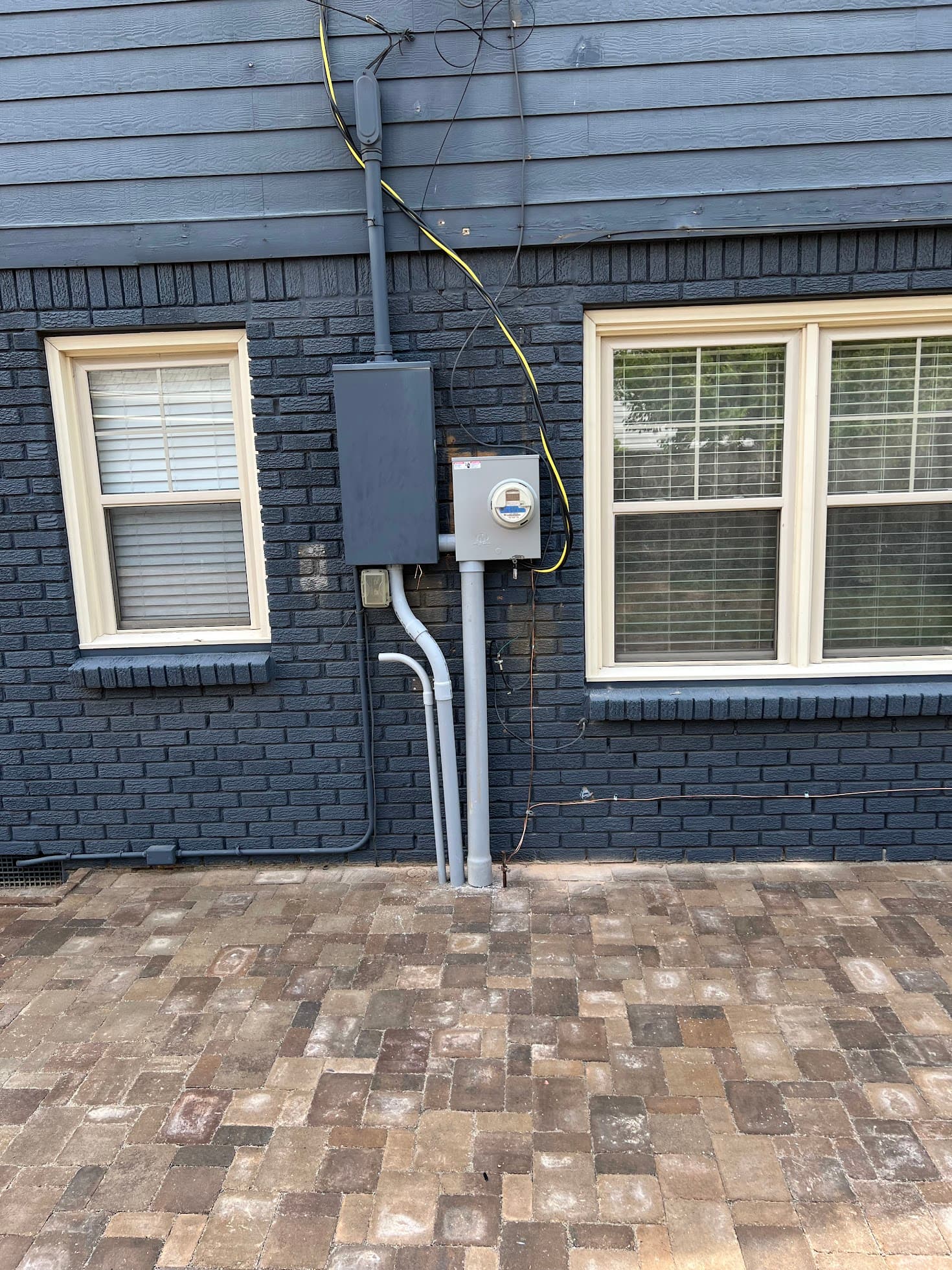 Recently completed M Electric service entrance and panel work at a Tulsa-area home — the kind of capacity check that should happen before a homeowner picks an EV charger